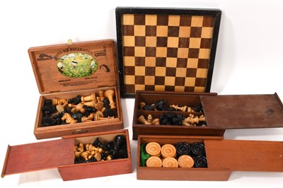 Lot 707 - Three sets of vintage wooden chess sets with a inlaid wooden chess board