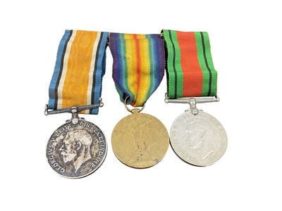 Lot 701 - First World War and later trio comprising War and Victory medals named to 63686 PTE. J. W. Harwood. Welsh R. and a Second World War Defence medal (mounted on bar).