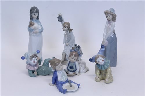Lot 2071 - Two Nao porcelain Clockswns and five Nao...