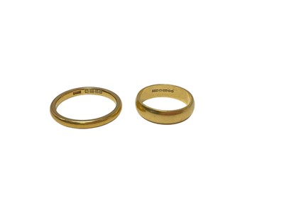 Lot 128 - 22ct gold wedding ring and 18ct gold wedding ring (2)