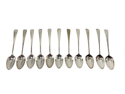 Lot 305 - Set of eleven George III silver Old English pattern dessert spoons, (London 1791), maker Peter & Ann Bateman, all at 11ozs.