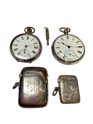 Lot 93 - Victorian silver cased pocket watch (Birmingham 1876), one other silver pocket watch and two Edwardian silver vesta cases
