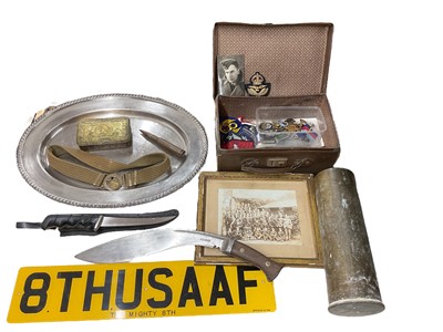 Lot 797 - Group of militaria to include a First World War Princess Mary gift tin, Second World War 1939 - 1945 Star, group of other military badges, a US Navy silver plated serving dish.