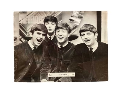 Lot 1492 - Autographs The Beatles signed photograph, signatures on the reverse.