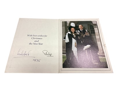 Lot 4 - H.M. Queen Elizabeth II and H.R.H. The Duke of Edinburgh, scarce hand signed 1975 Christmas card with twin gilt embossed Royal cyphers to cover, colour photograph of the Royal couple wearing Garte...