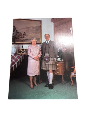 Lot 5 - H.M. Queen Elizabeth II and H.R.H. The Duke of Edinburgh, scarce hand signed 1995 Christmas card with colour photograph of the Royal couple at Balmoral to the cover, twin gilt Royal Cyphers to the...