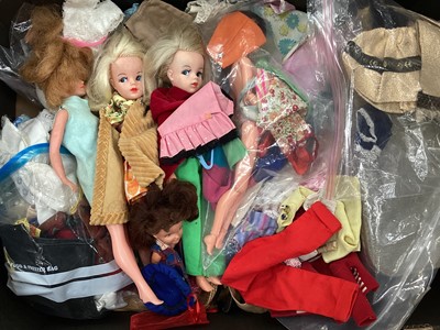 Lot 1973 - Four teenage dolls and a small Perfekta doll plus a good selection of teenage doll clothnig and some accessories. Clothing labels include Sindy, Linda, Faerie Glen, Tressy, Paul, Mego.