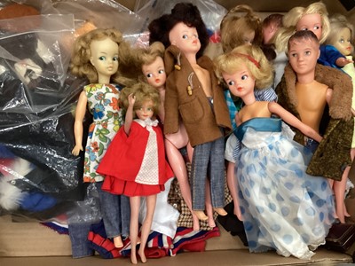 Lot 1974 - Two early Sindy dolls marked Made in England on neck just below hairline, Two Tammy dolls BS12 plus eight other dolls. Quantity of mainly 1960's/70's clothing including Sindy, Tressy