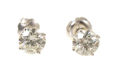 Lot 461 - Pair of diamond single stone stud earrings