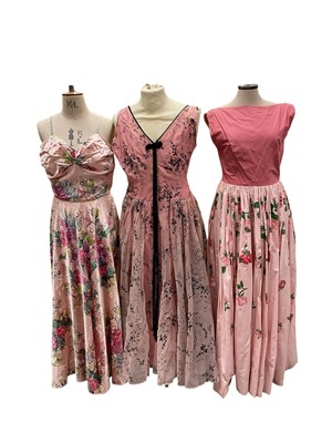 Lot 2120 - 1930s to 1950s selection of women's clothing including 1950s full skirt evening dresses, printed cotton day dress, straplessfloral dress by Howards, green wool day dress by John Selby, two bl...