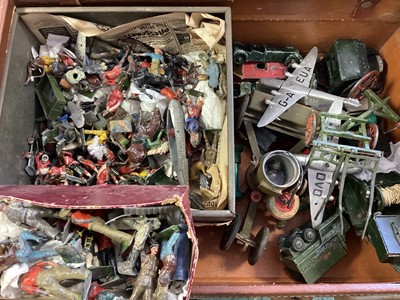 Lot 2040 - Suitcase containing a collection of vintage lead cowboys and Indians, animals & aircrafts and Miltary vehicles (qty)