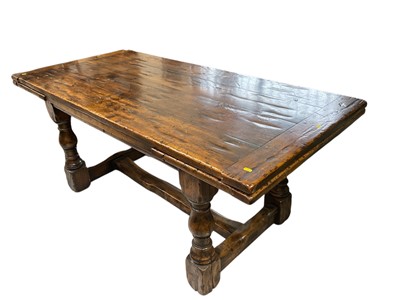 Lot 5226 - Good quality 17th century style solid oak refectory dining table with two extra leaves, on baluster turned legs joined by H-stretcher
