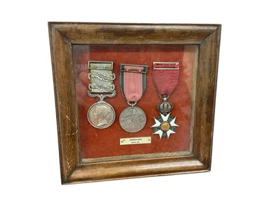 Lot 745 - Victorian medal trio comprising Crimea medal with two clasps- Inkermann and Sebastopol named to Lieut. James Lyons Royal Art., Turkish Crimea medal (Sardinia issue) and a French Legion d'Honneur.