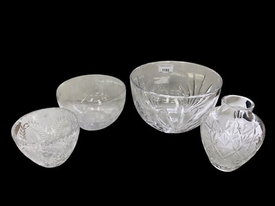 Lot 1153 - Two Tiffany & Co glass bowls, 20cm diameter and 16cm diameter, together with another bowl and a vase (4)