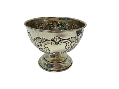 Lot 20 - Edwardian Mappin & Webb silver pedestal bowl with embossed floral scroll decoration (London 1907)