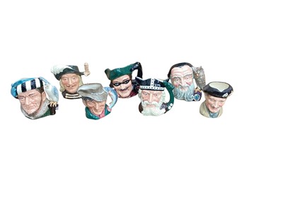 Lot 1169 - Seven Royal Doulton character jugs - Monty D6202, Viking D6496, Merlin D6529, Aramis D6441, The Poacher D6429, Dick Turpin D6528 and The Falconer D6533