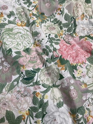 Lot 2133 - Pair of lined curtains yellow floral design, measure 90cms across pencil pleat, drop 210cms, plus narrow pelmet. Blue floral curtain, lined and interlined, measures 60 cms across pencil ple...