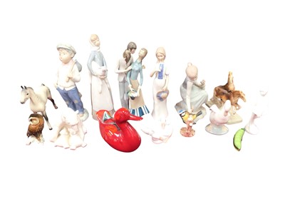 Lot 1167 - Two Lladro porcelain figures, together with other items including Goebel horse, Poole pottery duck, Doulton figure etc (qty)