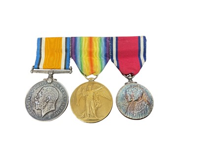 Lot 737 - First World War and later trio comprising War and Victory medals named to Lieut. C. E. W. Neat. and a George V 1935 Silver Jubilee medal (mounted on bar).