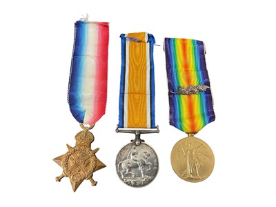 Lot 738 - First World War 1914 Star trio comprising 1914 'Mons Star' named to FLT. Payr. E. H. Neat. R.N. Transport Staff, War medal and Victory medal with Mentioned in Despatches (M.I.D. Oak Leaf) named...