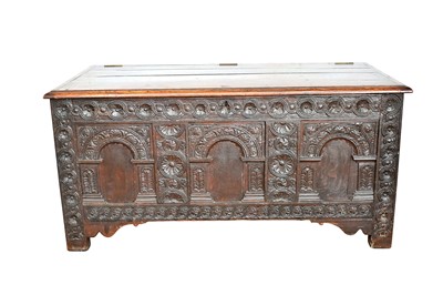 Lot 1318 - 18th century carved oak coffer