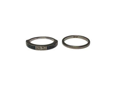 Lot 16 - Sapphire and diamond half eternity ring and an 18ct white wedding ring