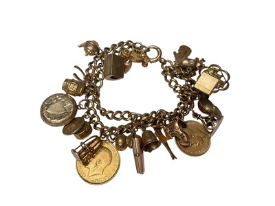 Lot 19 - 9ct gold double row curb link charm bracelet with various 9ct gold and yellow metal charms including a George V gold full sovereign, 1913 and George V gold half sovereign 1912