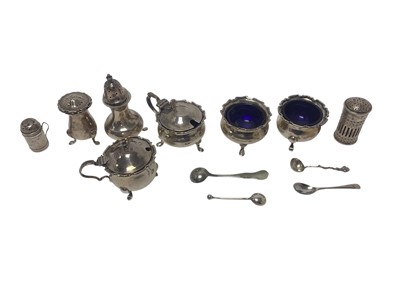 Lot 253 - Group of silver condiments to include mustard pots, salt cellars and pepperettes, (various dates and makers), all at approximately 9ozs.