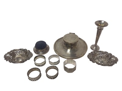Lot 264 - George V silver capstan inkwell (Birmingham 1911), together with five silver napkin rings, silver spill vase, pin cushion and pair of bonbon dishes (various dates and makers).