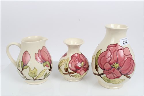 Lot 2121 - Two Moorcroft pottery vases decorated in the...