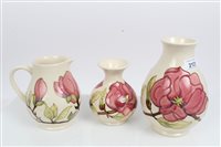 Lot 2121 - Two Moorcroft pottery vases decorated in the...