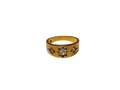 Lot 89 - 18ct gold diamond three stone gypsy set ring