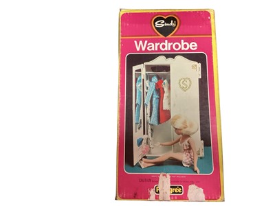 Lot 2076 - Pedigree vintage Sindy doll bedroom furniture including wardrobe no.44502, Bed No.44503, Bedside Table & Lamp No.44506 and Dressing Table & stool No.44505, boxed (4)