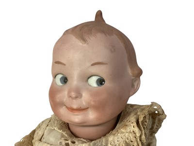 Lot 2053 - Armand Marseille doll George Borgfeldt 259? A.6/0. M DRMR bisque head painted googly eyes Kewpie doll, composite body and limbs , original clothing.