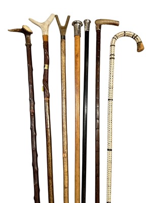 Lot 785 - Collection of sticks including shark vertebrae stick, rose gold mounted stick others