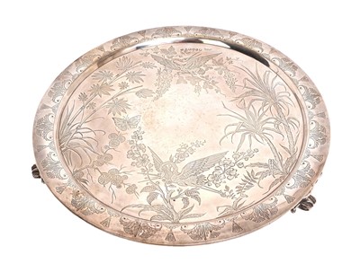 Lot 290 - Fine quality Victorian silver salver with Aesthetic style engraved decoration depicting cranes, butterflies, palms, ferns and exotic foliage, on three feet, (London 1874)