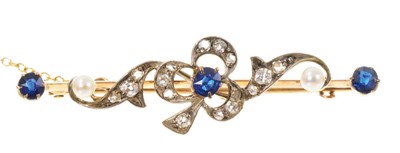 Lot 429 - Late Victorian diamond, sapphire and pearl bar brooch with cloverleaf design, set with a central blue sapphire surrounded by rose cut diamonds with two pearls and two further sapphires