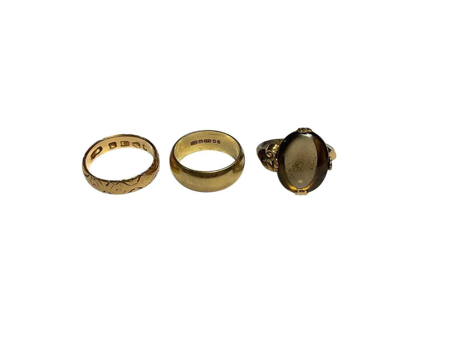 Lot 20 - Victorian 18ct gold wedding ring with engraved decoration, 9ct gold wedding ring and a gem set gold plated dress ring (3)