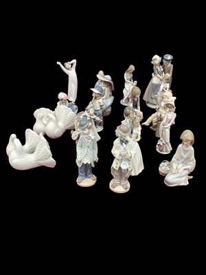 Lot 1240 - Collection of 20 Lladro porcelain figures including two clowns, Dutch couple, boy with baseball bat etc