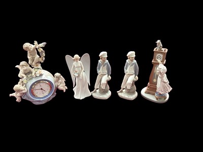 Lot 1243 - Lladro porcelain clock figurine - Angelic Time, together with four other Lladro figures (5)