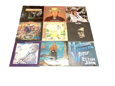 Lot 2233 - Box of records to include Elton John, Bob Dylan, Simon and Garfunkel, Supertramp plus Elvis Jigsaw. Some 7" singles and CDs