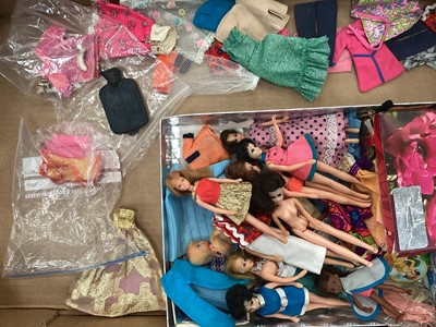 Lot 2060 - Group of small fashion dolls, head marks include H17, 110, A10, 210 with mixed clothing and accessories. Two Flatey dolls plus bicycle, Sindy head 03055X and three other teenage dolls. In two...