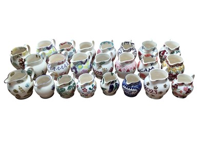 Lot 1178 - Collection of 23 Emma Bridgewater jugs in various designs