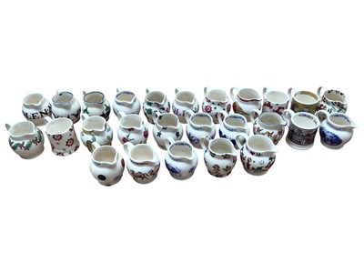 Lot 1181 - Collection of 26 small Emma Bridgewater jugs and mugs in various designs including Liberty London, Victorian Nursery etc