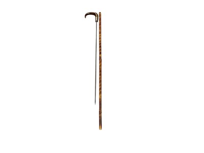 Lot 933 - Early 20th century sword stick with horn handle, white metal mount with 64cm spike blade in bamboo shaft