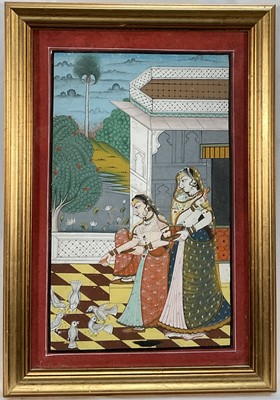 Lot 73 - Indian gouache painting of two female figures in a courtyard feeding birds, in glazed gilt frame, 28cm x 17.5cm