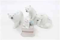 Lot 2162 - Three Lladro porcelain polar bears and another...