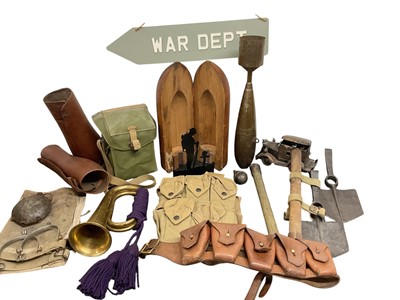 Lot 757 - Group of assorted Militaria to include a dummy bomb, canvas webbing items and bugle, (1 box).