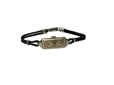 Lot 108 - Art Deco white gold (marked 15ct) diamond set cocktail watch on black double cord strap
