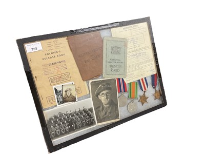 Lot 768 - Second World War medal group comprising 1939 - 1945 Star, France and German Star, Defence and War medals, mounted in glazed case with Soldier's Service and Pay book, Soldier's Release book and p...